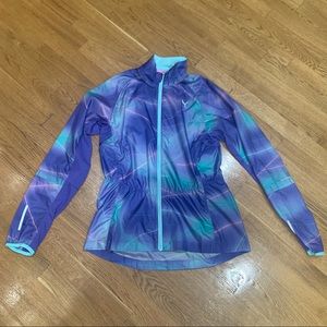 Bright neon Puma workout windbreaker.